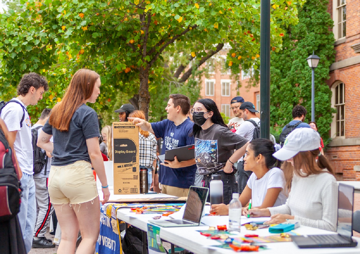 students tabling at involvement fair