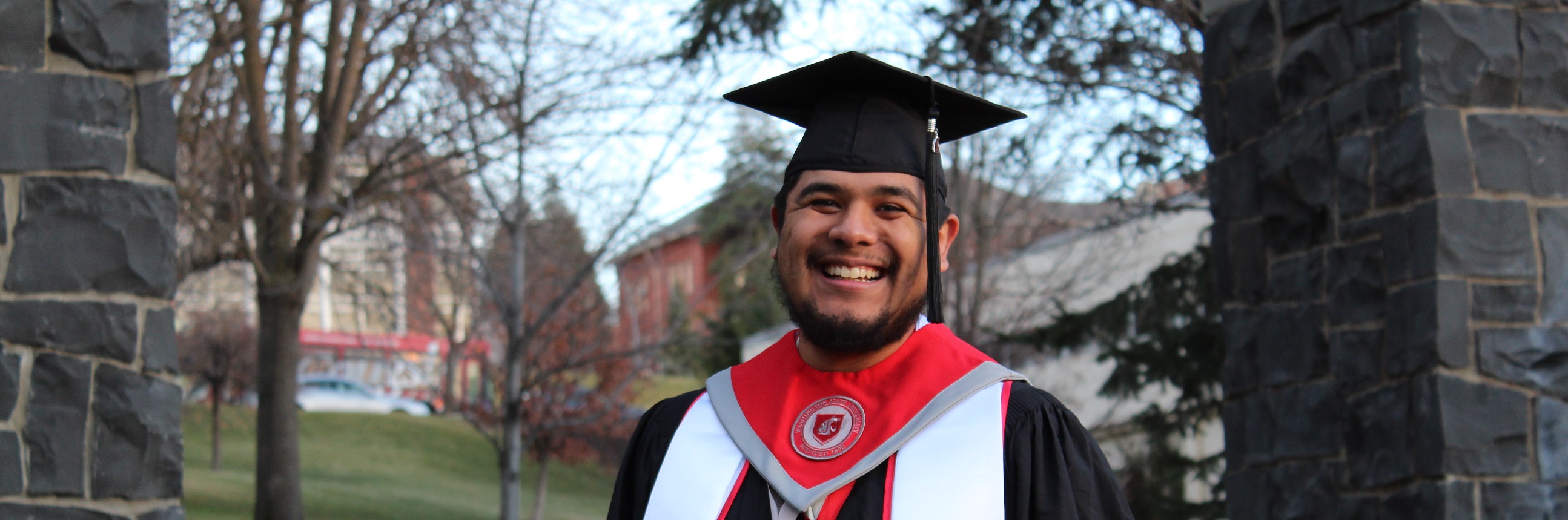 student in graduation cap and gown